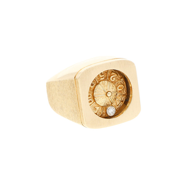 Anillo diseño especial motivo ruleta con diamante en oro amarillo 14 kilates.