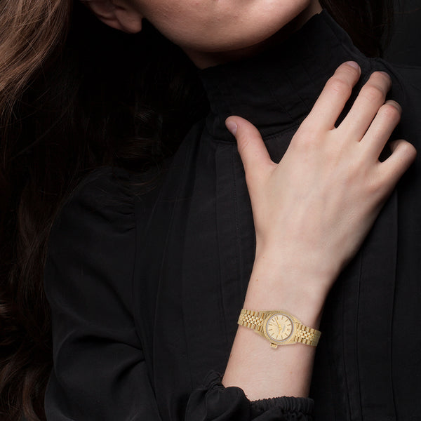 Reloj Rolex para dama modelo Oyster Perpetual en oro dos tonos 18 kilates.