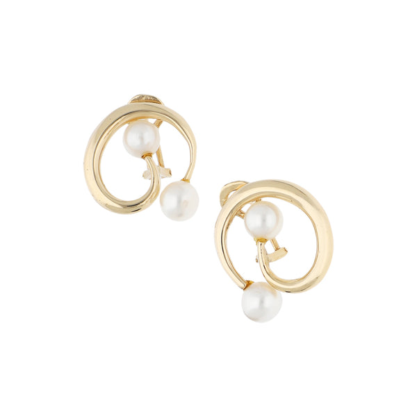 Aretes diseño especial con perlas en oro amarillo 14 kilates.