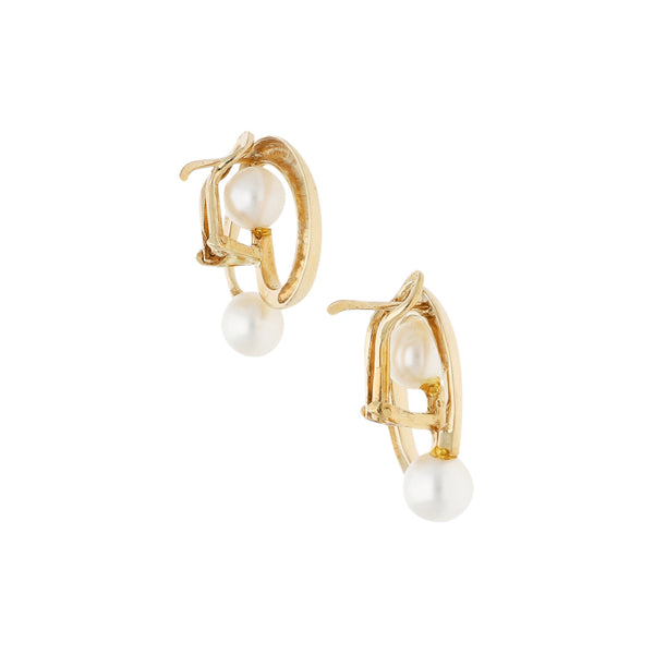Aretes diseño especial con perlas en oro amarillo 14 kilates.