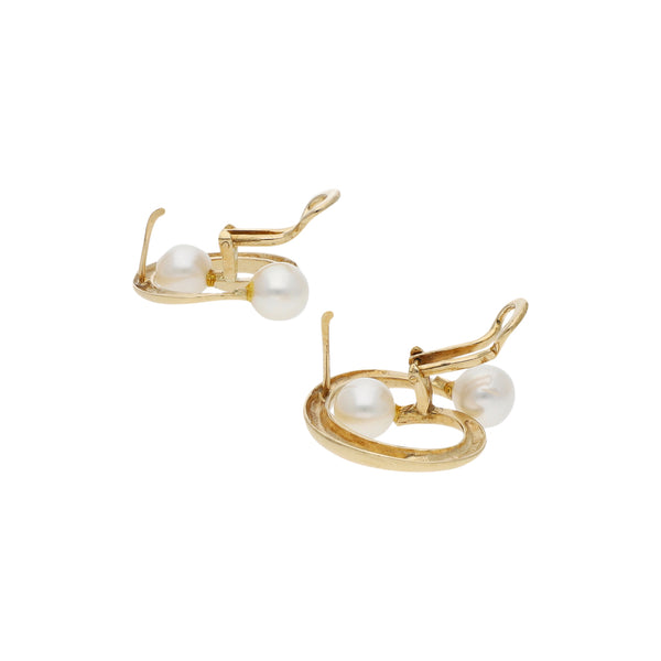 Aretes diseño especial con perlas en oro amarillo 14 kilates.
