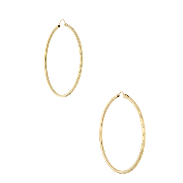 Arracadas facetadas en oro amarillo 12 kilates.