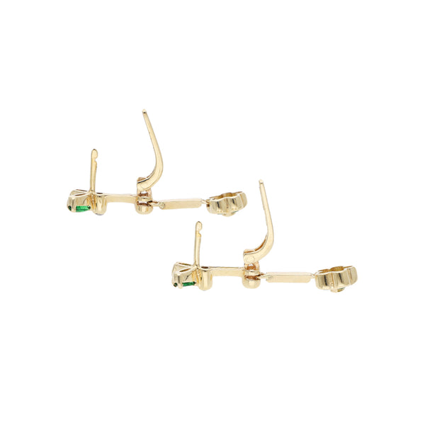 Juego de anillo y aretes diseño especial con sintéticos en oro amarillo 14 kilates.