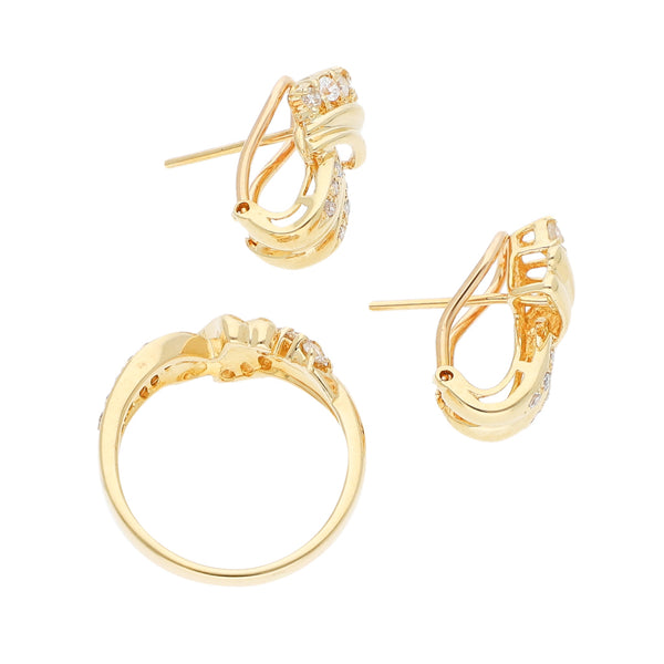 Juego de anillo y aretes diseño especial con diamantes en oro amarillo 18 kilates.