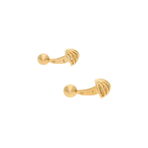 Mancuernillas diseño especial firma Tane en oro amarillo 18 kilates.