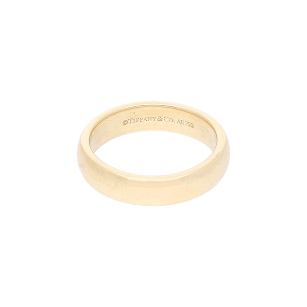 Argolla lisa firma Tiffany & Co. en oro amarillo 18 kilates.