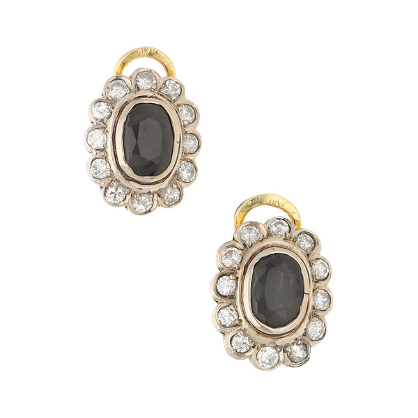 Aretes diseño especial con diamantes y ónix en oro amarillo 14 kilates.