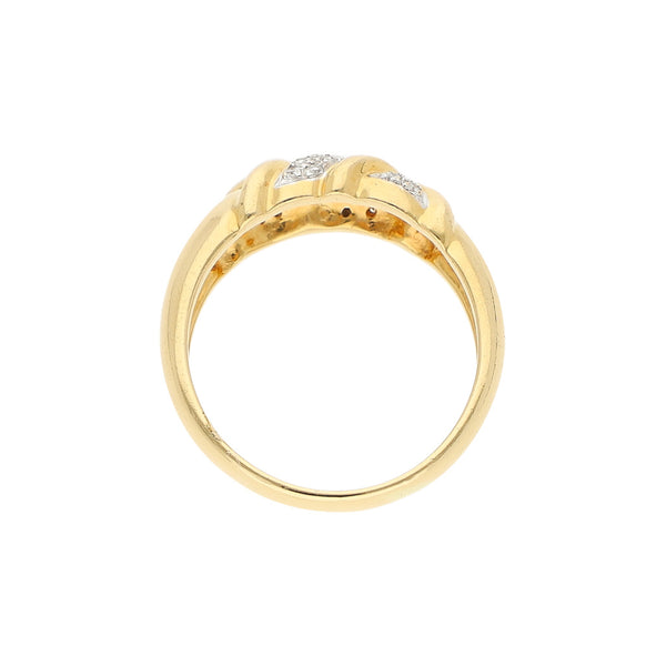 Anillo diseño estilizado con diamantes en oro amarillo 18 kilates.