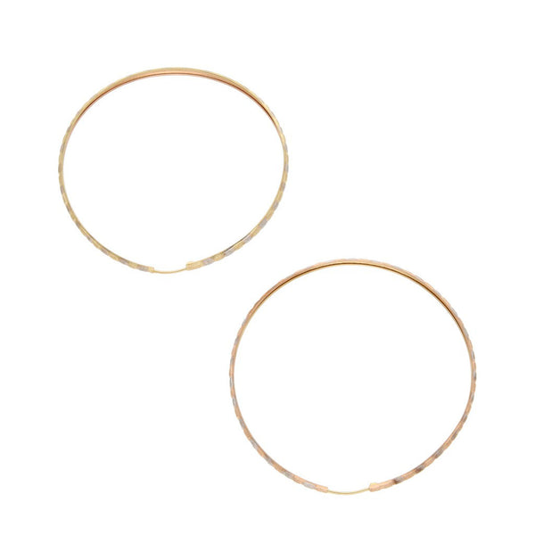 Arracadas laminadas en oro tres tonos 12 kilates.