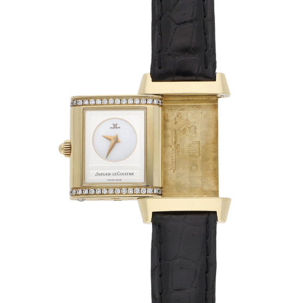 Reloj Jaeger-LeCoultre para dama modelo Reverso caja y broche en oro amarillo 18 kilates.