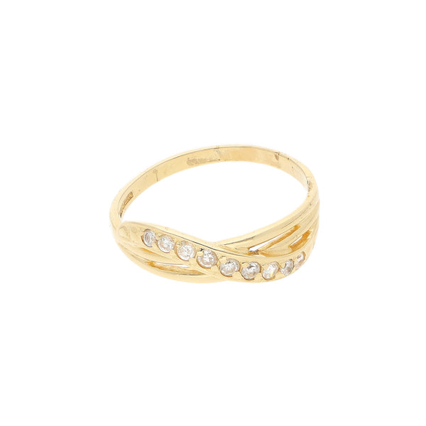 Anillo estilizado motivo infinito con sintéticos en oro amarillo 14 kilates.