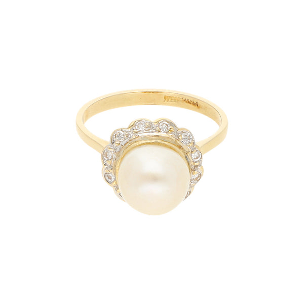 Anillo diseño especial con perla y sintéticos en oro amarillo 14 kilates.