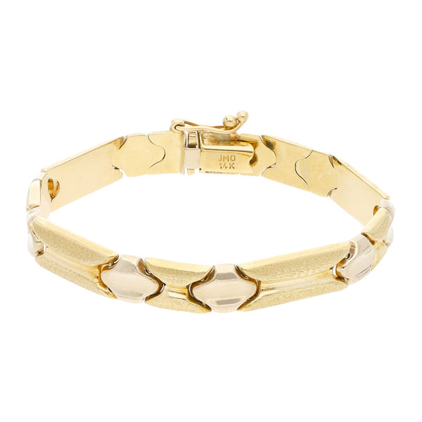 Pulsera eslabón articulado en oro dos tonos 14 kilates.