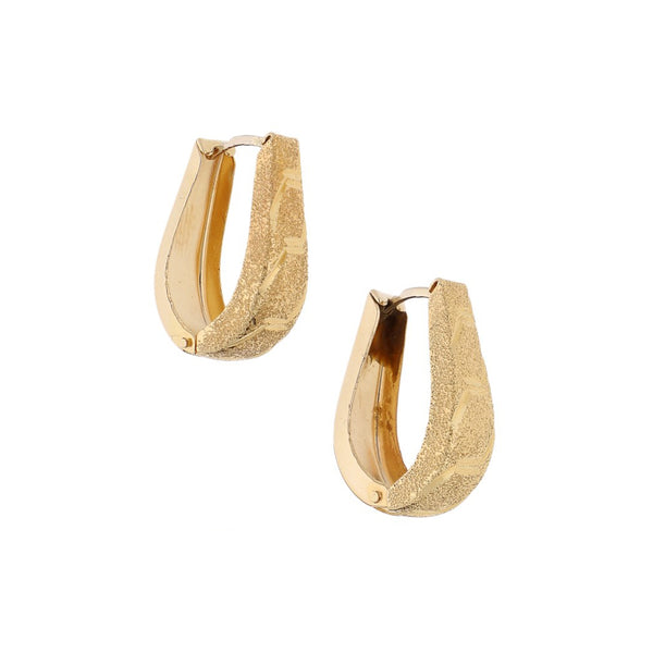Arracadas articuladas en oro amarillo 14 kilates.