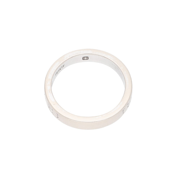 Argolla diseño estilizado firma Bvlgari con diamante en oro blanco 18 kilates.