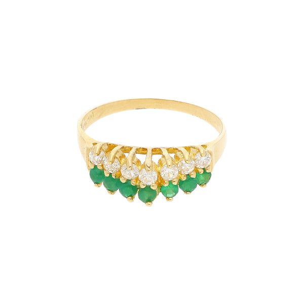 Anillo diseño especial con sintéticos en oro amarillo 12 kilates.
