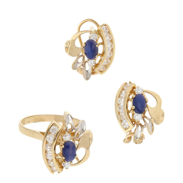 Juego de anillo y aretes calados con sintéticos en oro amarillo 14 kilates.