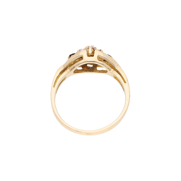 Anillo diseño especial motivo flor con sintéticos en oro amarillo 14 kilates.