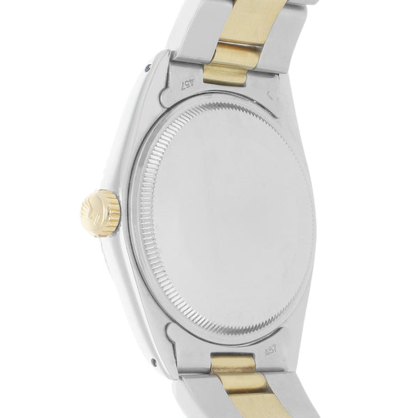 Reloj Rolex para caballero modelo Oyster Perpetual Date vistas en oro amarillo 14 kilates.