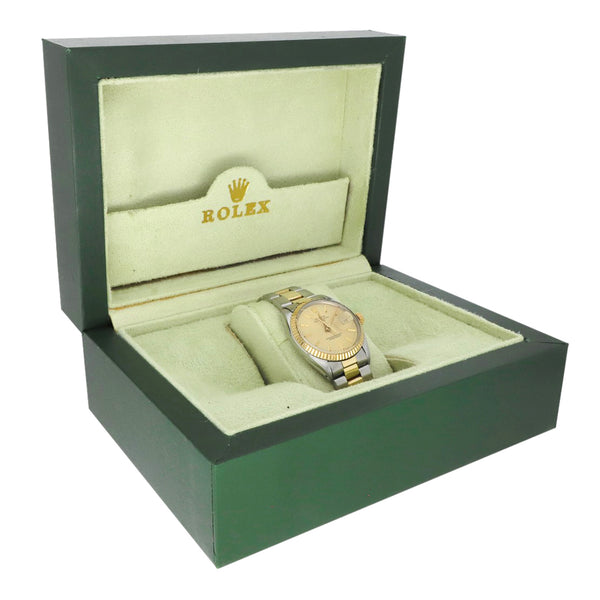 Reloj Rolex para caballero modelo Oyster Perpetual Date vistas en oro amarillo 14 kilates.