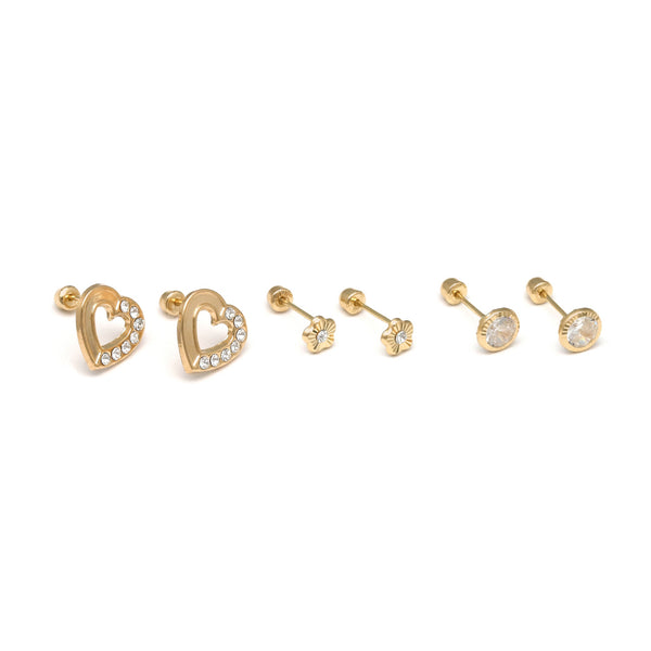 Tres pares de broqueles diseño especial con sintéticos en oro amarillo 14 kilates.