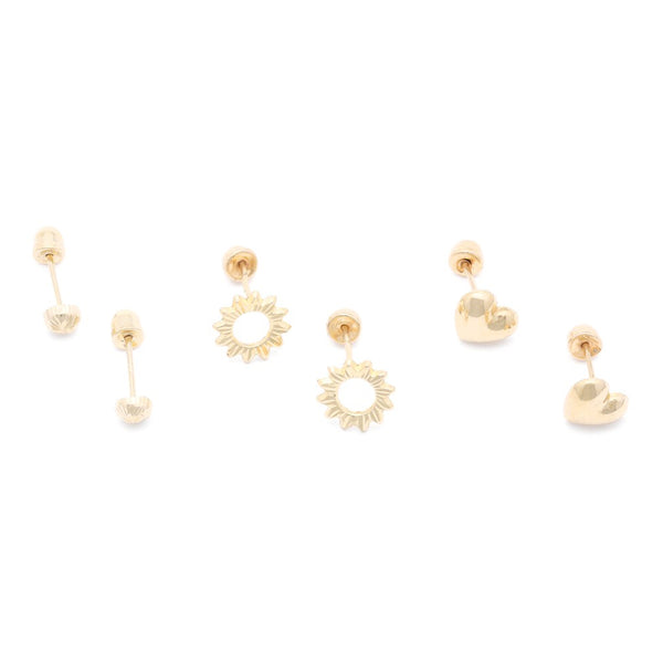 Tres pares de broqueles diseño especial en oro amarillo 14 kilates.