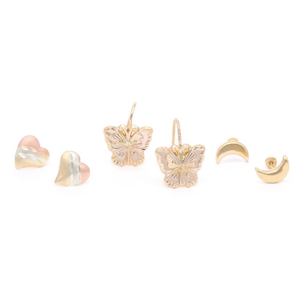 Tres pares de aretes diseño especial en oro amarillo 14 kilates.