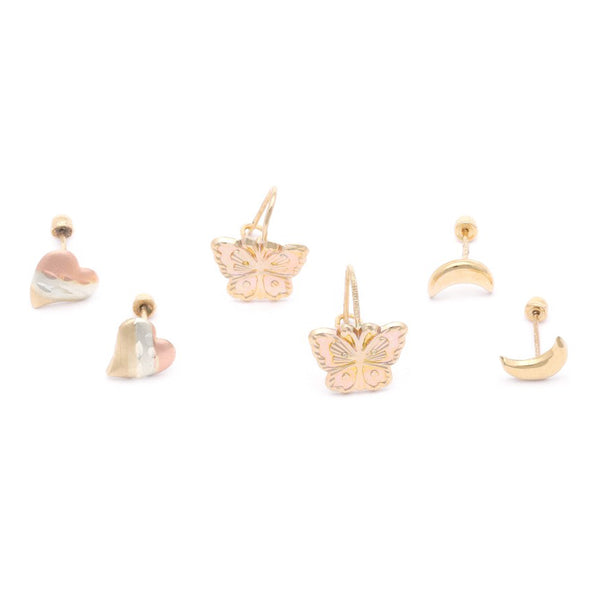 Tres pares de aretes diseño especial en oro amarillo 14 kilates.