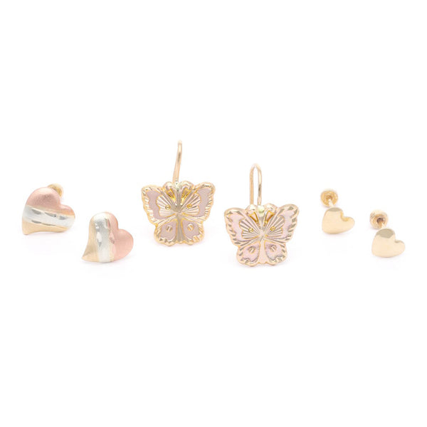 Tres pares de aretes diseño especial en oro amarillo 14 kilates.