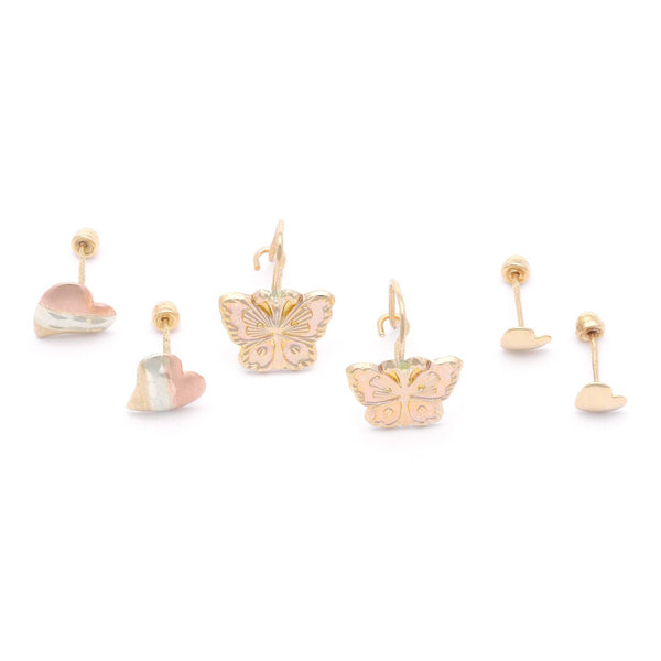 Tres pares de aretes diseño especial en oro amarillo 14 kilates.