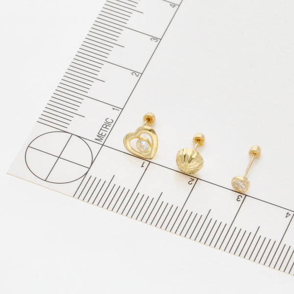 Tres pares de broqueles diseño especial dos con sintéticos en oro amarillo 14 kilates.