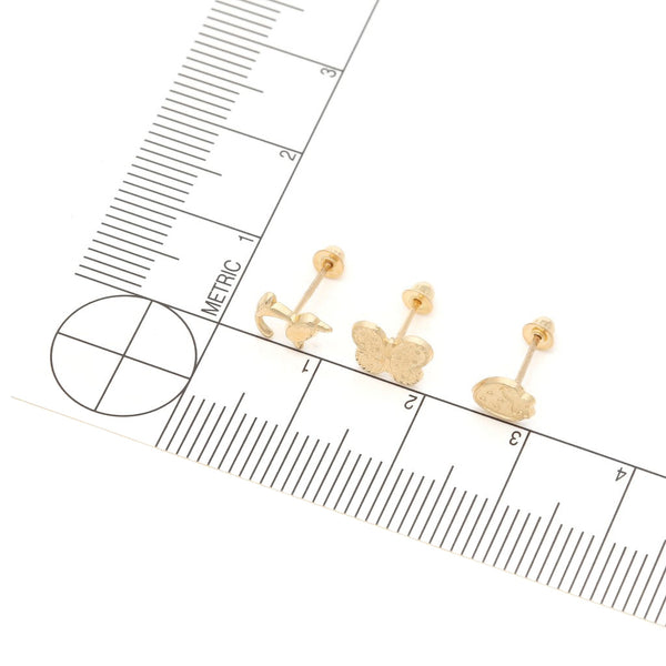 Tres pares de broqueles diseño especial en oro amarillo 14 kilates.