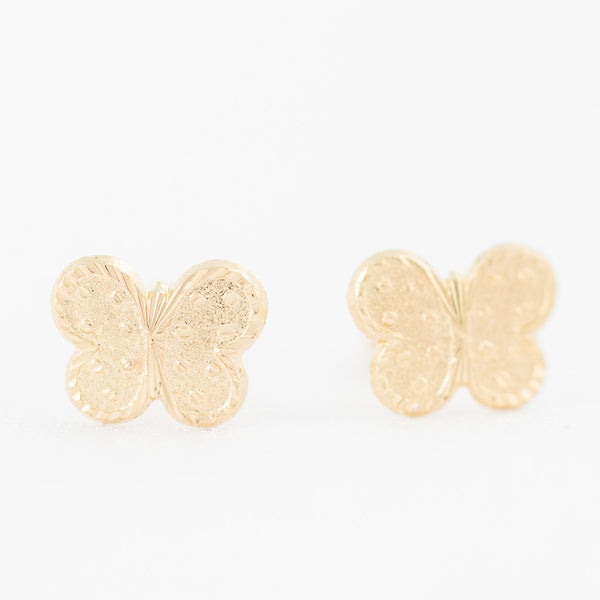 Tres pares de broqueles diseño especial en oro amarillo 14 kilates.