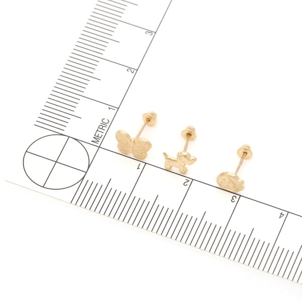 Tres pares de broqueles diseño especial en oro amarillo 14 kilates.