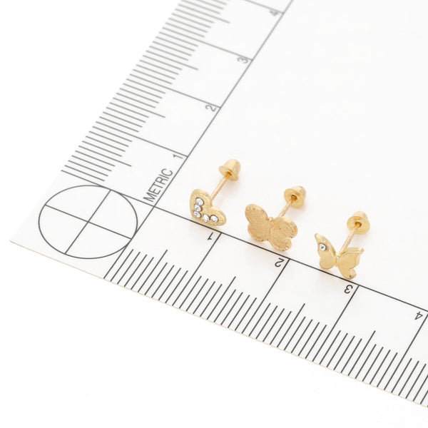 Tres pares de broqueles diseño especial dos con sintéticos en oro amarillo 14 kilates.