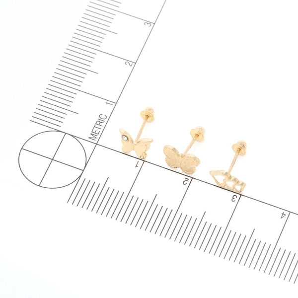 Tres pares de broqueles diseño especial uno con sintéticos en oro amarillo 14 kilates.