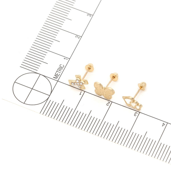 Tres pares de broqueles diseño especial uno con sintéticos en oro amarillo 14 kilates.