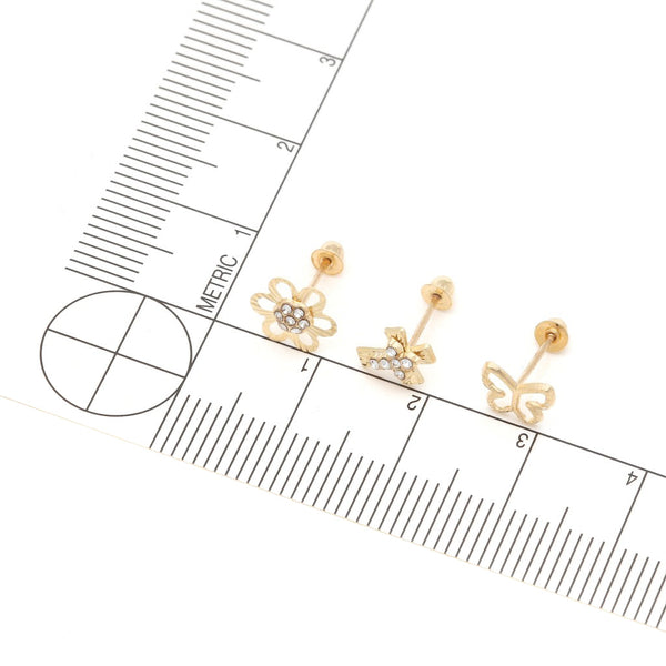 Tres pares de broqueles diseño especial dos con sintéticos en oro amarillo 14 kilates.