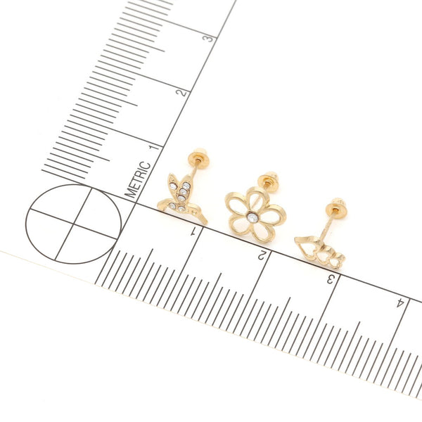 Tres pares de broqueles diseño especial dos con sintéticos en oro amarillo 14 kilates.