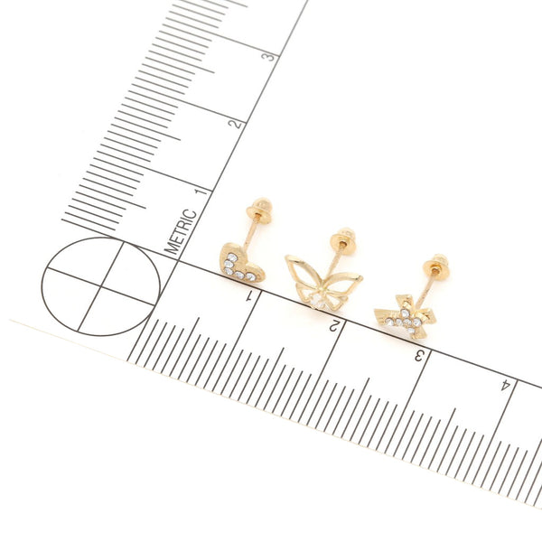 Tres pares de broqueles diseño especial con sintéticos en oro amarillo 14 kilates.