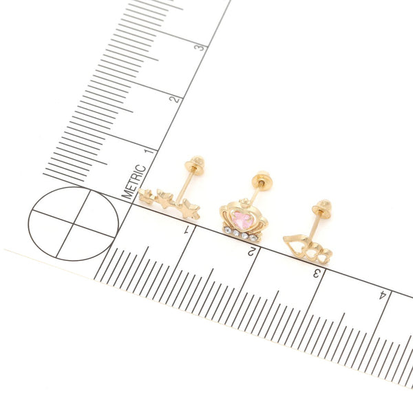 Tres pares de broqueles diseño especial uno con sintéticos en oro amarillo 14 kilates.