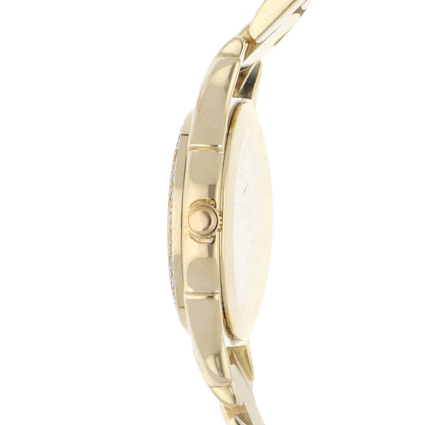 Reloj Movado para dama en oro amarillo 14 kilates.