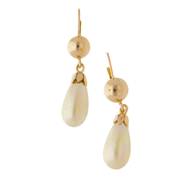 Aretes hechura especial con perlas en oro amarillo 14 kilates.