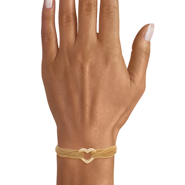 Pulsera eslabón cruzado en hilos motivo corazón firma Tiffany & Co. en oro amarillo 18 kilates.