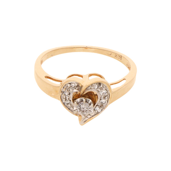 Anillo calado con diamantes motivo corazón en oro amarillo 12 kilates.