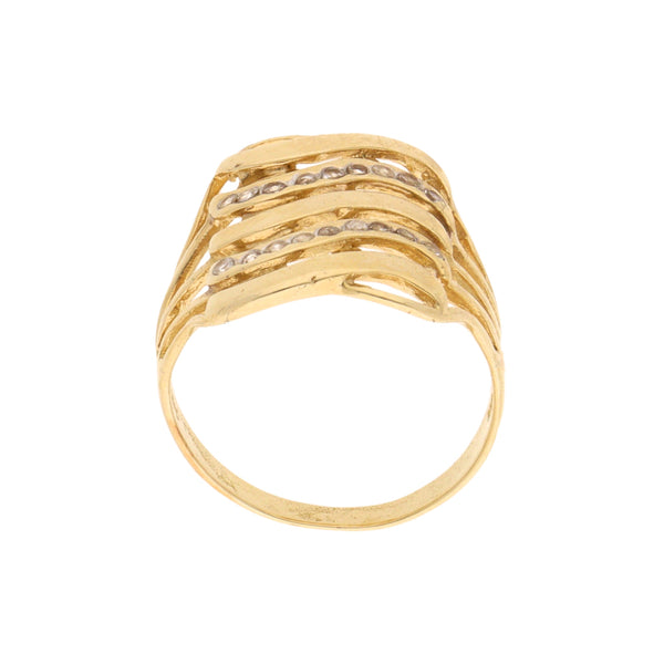 Anillo calado con circonias en oro amarillo 12 kilates.