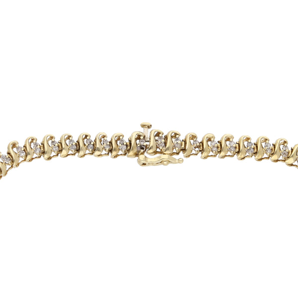 Pulsera eslabón articulado con diamantes en oro amarillo 10 kilates.