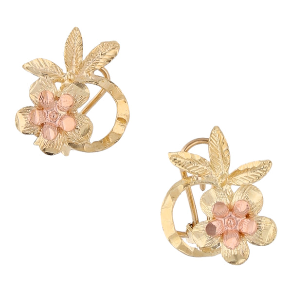 Aretes calados motivo floral en oro dos tonos 10 kilates.