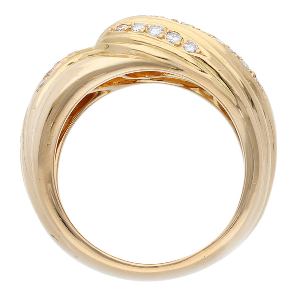 Anillo estilizado motivo sirena firma Carrera y Carrera con diamantes en oro amarillo 18 kilates.