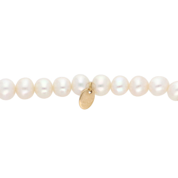 Pulsera hechura especial con perlas y cuarzos motivo flor firma Tous, aplicaciones en oro amarillo 18 kilates.